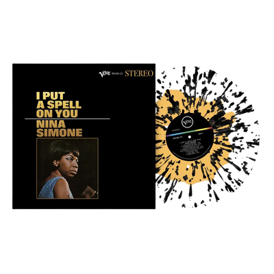 vinile i put a spell on you di nina simone coprtina nera con foto della cantante e disco in vinile in vista effetto splatter colorato trasperente giallo e nero
