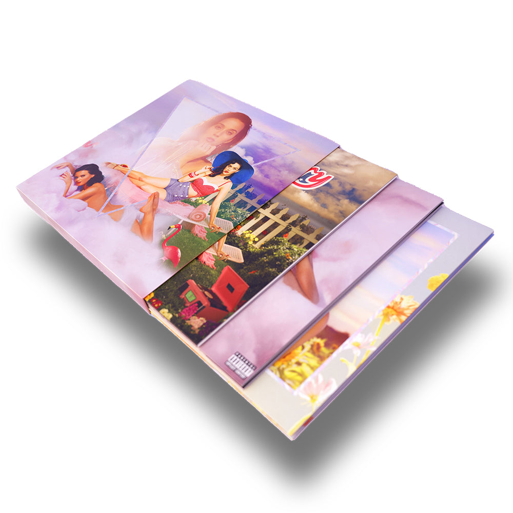 Cofanetto di Katy Perry con immagini esclusive e copertine alternative che contiene 5 LP Colorati 45 giri Colorato Inserti Fotografici Esclusivi  Poster Calendario 2024 Photobook di 12 pagine 