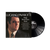 vinile nero LP singolo lpong playing 33 giri con incisioni e copertina che ritrae il tenore luciano pavarotti da giovane su sfondo nero