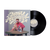 vinile nero nuovo album di dargen d'amico con foto del cantante in copertina e titolo del disco doppia mozzarella con effetto dripping sciolto