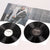 Il doppio vinile nero dell'album Views di Drake con l'interno della custodia con note descrittive sulle canzoni