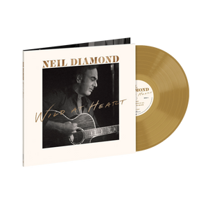 Neil Diamond – Wild at Heart nuovo album vinile LP color bronzo, copertina con foto in bianco e nero dell’artista mentre suona la chitarra, packaging elegante con titolo dorato.