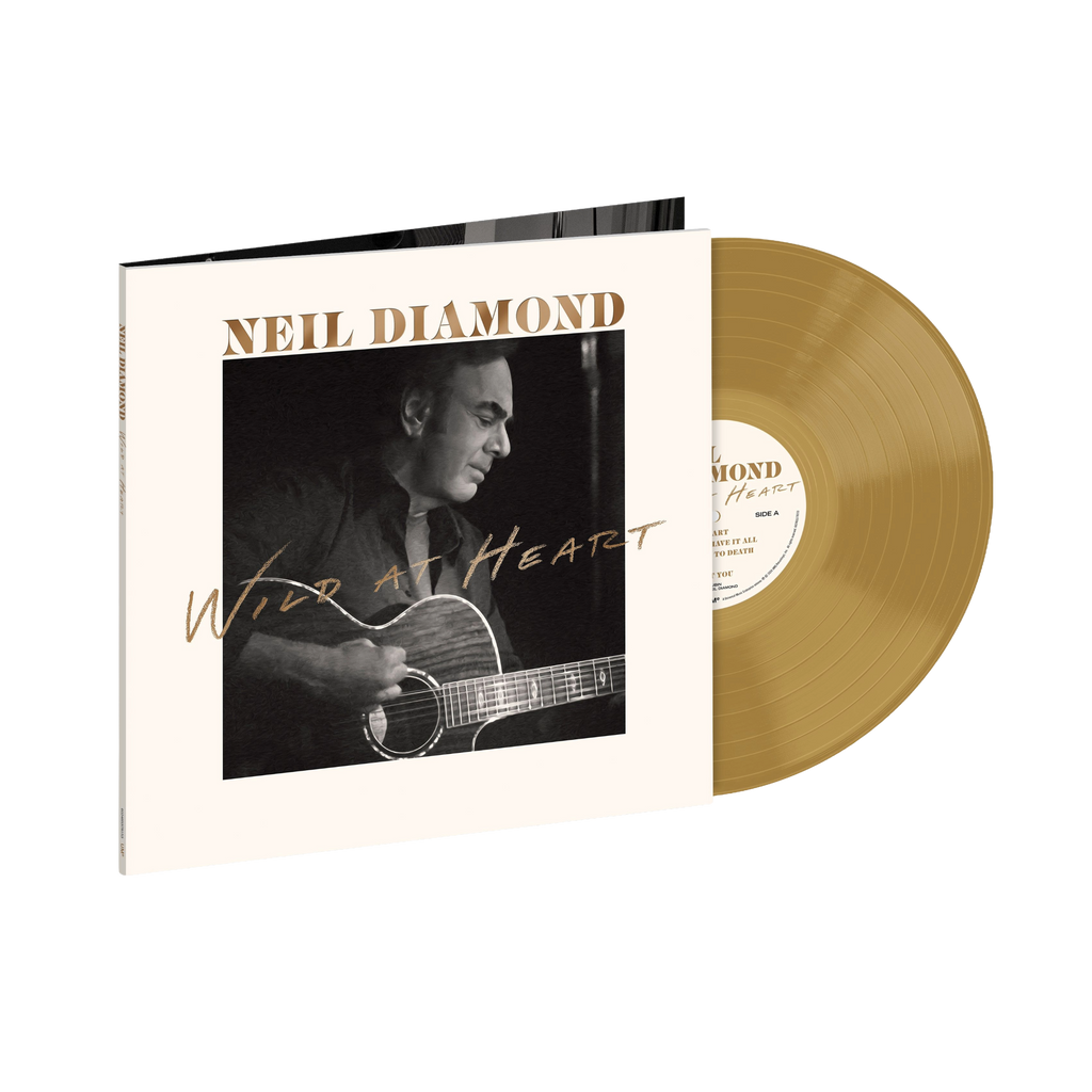 Neil Diamond – Wild at Heart nuovo album vinile LP color bronzo, copertina con foto in bianco e nero dell’artista mentre suona la chitarra, packaging elegante con titolo dorato.