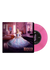 Vinyl record pink colour with a cover featuring the singer Ariana Grande in a blue dress and the title 'Wicked'