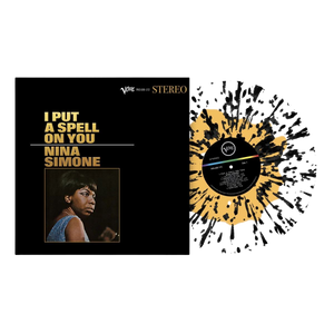 vinile i put a spell on you di nina simone coprtina nera con foto della cantante e disco in vinile in vista effetto splatter colorato trasperente giallo e nero