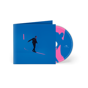 CD minigatefold con copertina blu e foto con sfondo colorato dalla quale si vede il compact disc che esce con tonalità rosa e azzurre dal titolo E Poi Scegliere Con Cura Le Parole di Mauro Ermanno Giovanardi