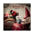 copertina frontale dell'alum il sogno eretico di caparezza, libro la piccola fiammiferaia, fiamme e toni del rosso